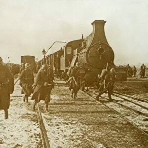 Troops disembarking from steam train, c1914-c1918