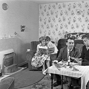 Typical working class living room scene with family, 11 July 1962