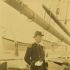 Unidentified naval officer, full-length portrait, standing aboard ship, facing right, 1894 or 1895. Creator: Alfred Lee Broadbent