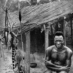 A witch doctor, Belgian Congo (Congo Republic), 1922. Artist: JH Harris