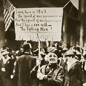 Woman holding a placard in support of the war effort, USA, World War I, c1914-c1918