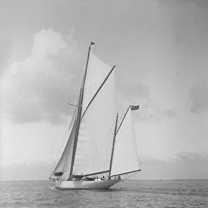 The yawl White Heather I sailing close-hauled, 1911. Creator: Kirk & Sons of Cowes