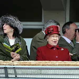 Queen Elizabeth enjoys the racing at the Cheltenham Festival