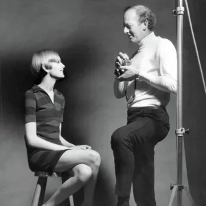 Twiggy and photographer John Cowan during a photo-shoot at his s