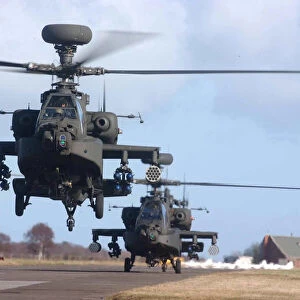 Armys new AH64D Apache Longbow helicopters depart from RAF Leuchars. 01 / 03 / 2002