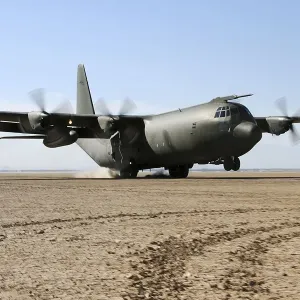 A Royal Air Force C130K Hercules takes off from the Californian desert A Royal Air Force C130K Hercules takes off from the Californian desert