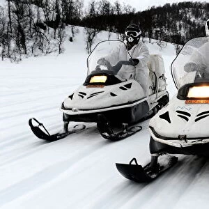Royal Marines Driving Ski-Doos on Exercise in Norway
