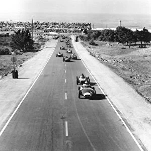 1958 Moroccan Grand Prix - Start: Stirling Moss leads Phil Hill at the start of the race. They finished in 1st and 3rd positions respectively, action