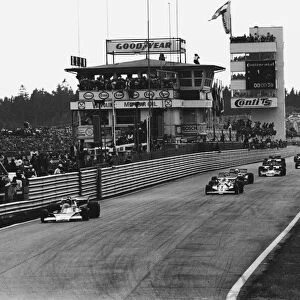 1976 German Grand Prix: James Hunt, 1st position leads at the restart, action