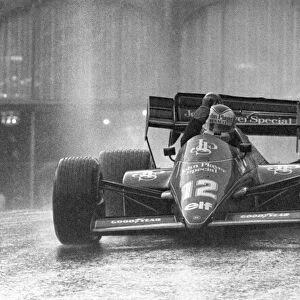 1984 Monaco Grand Prix: Nigel Mansell, Lotus 95T-Renault, retired, after crashing out of the lead in the rain, action