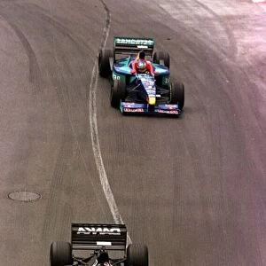 1998 MONACO GP. Mika Salo, Arrows, leads the charging Jean Alesi