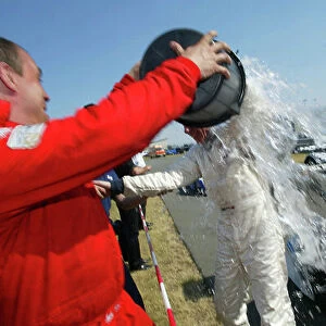 2003 FIA Sportscar Championship Oschersleben, Germany. 19th - 20th July 2003. Andy Wallace gets an early bath courtesy of his team. World Copyright: John Brooks/LAT Photographic ref: Digital Image Only