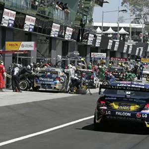 2004 Australian V8 Supercars. Bathurst 1000, Bathurst, Australia. 10th October 2004 Paul Radisich (Ford) leaves the pits after a stop. Action. Photo: Mark Horsburgh/LAT Photographic Ref:Digital Image only