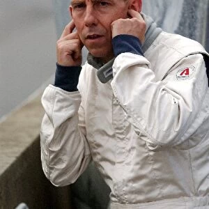 Andy Wallace (GBR) RN Motorsports watching the cars go down the hill into Eau Rouge