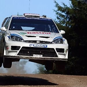 FIA World Rally Championship: Markko Martin jumps his Ford Focus RS WRC 03 on stage 12