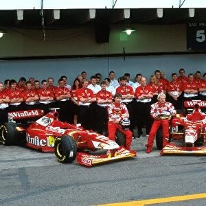Formula One World Championship: Heinz-Harald Frentzen Williams, Jacques Villeneuve Williams and the rest of Williams Team pose for a Team Picture