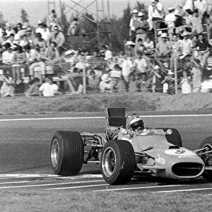 Formula One World Championship: Henri Pescarolo Matra MS11 goes for it over the low kerbs, he finished 9th