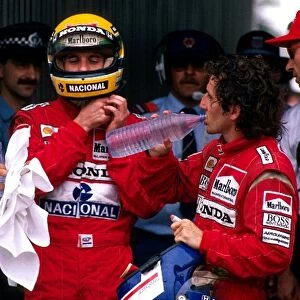 Formula One World Championship: L-R: McLaren team mates Ayrton Senna and Alain Prost. McLaren team co-ordinator Jo Ramirez is pictured on the right