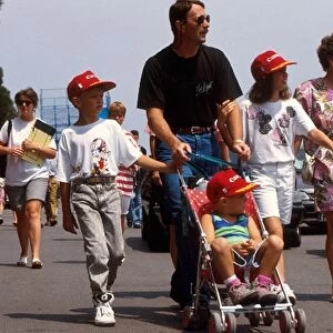 Formula One World Championship: Nigel Mansell with wife Roseanne and family enjoying a walk