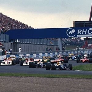 Formula One World Championship: Riccardo Patrese Williams FW14 / B leads at the start of the race