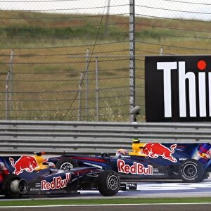 Formula One World Championship: Sebastian Vettel Red Bull Racing RB6 and team mate Mark Webber Red Bull Racing RB6 after the two collided in