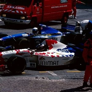 Formula One World Championship: Taki Inoue Footwork Hart FA16 and Bertrand Gachot Pacific Cosworth PR02 are recovered from the Ste