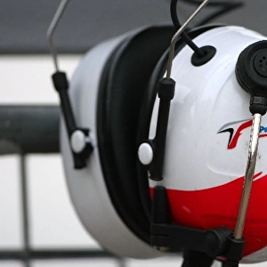 Formula One World Championship: Toyota headphones hang from a Toyota pit board