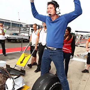 Formula One World Championship: Vernon Kay TV Presenter and BBC Radio 1 DJ practices pit stops with the Force India F1 Team