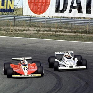 Gilles Villeneuve leads Alan Jones Dutch Grand Prix, Zandvoort, Holland