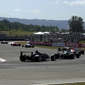 Luis Diaz leads the field out of the Festival chicane on the second lap of the Portland Toyota Atlantic
