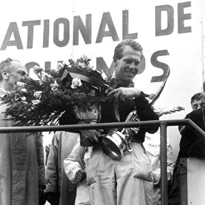 Spa Francorchamps, Belgium. 1956: Race winner Peter Collins, podium