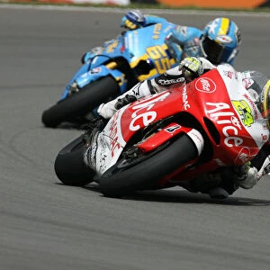 Toni Elias Alice Ducati battles with Loris Capirossi Rizla Suzuki for the remaining