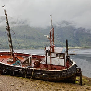 A Fishing Boat Abandoned On The Shore; Ardgour Isle Of Mull Scotland
