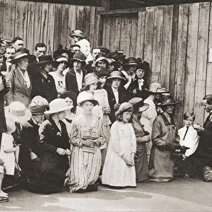 Irish men, women and children on their knees praying in Downing Street during the Anglo-Irish Treaty meetings of 1921. The Anglo-Irish Treaty, also known as The Treaty, was an agreement between the government of the United Kingdom of Great Britain and Ireland and representatives of the Irish Republic that ended the Irish War of Independence and provided for the establishment of the Irish Free State. From These Tremendous Years, published 1938