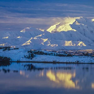 Morning light on snow covered Denali Mountain, Denali National Park, Alaska, USA