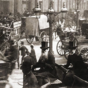 Photograaph outside the Bank of England pre 1900. Victorian horse draw busses with crts and lots of people