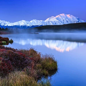 Reflection at sunrise, Wonder Lake, Denali National Park and Preserve, Alaska, USA