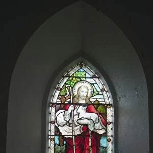 A Stained Glass Window Depicting Jesus Holding A Sheep At Church On The Beach; Ardnamurchan, Argyl, Scotland