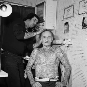 72-year-old Wilf Hardy whos body is covered in tattoos