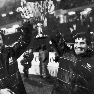 Aberdeen manager Alex Ferguson and assistant Archie Knox holding the European Cup Winners