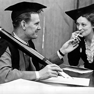 Actor Will Hay seen here with an outsize pen, does the vey best to break school rule