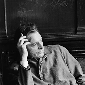 Actor Richard Burton, enjoying a moment of reflection in a London pub while shooting