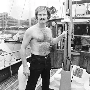 Actor Tony Adams who appeared in Crossroads on board his boat October 1978