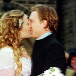 Actress Kate Winslet and Jim Threapleton November 1998 kissing after their surprise