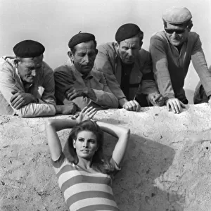 Actress Raquel Welch on location for film shoot 1966 Wearing striped mini