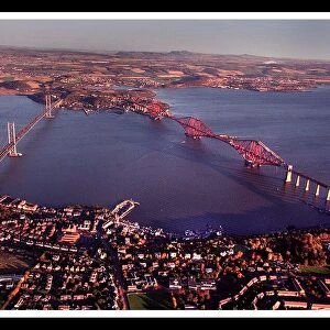 Aerial view of Edinburgh showing Forth rail road bridge November 1998