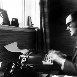 Alan Whicker TV Presenter in his office at his Regent