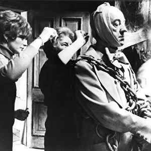 Alec Guinness preparing to film ghost scene in film musical Scrooge - February 1970