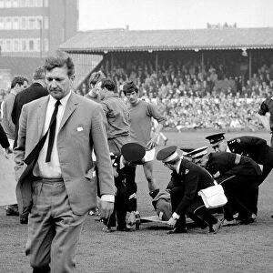 Alec Stock Manager of QPR - April 1968 Walking away from injured player Morgan