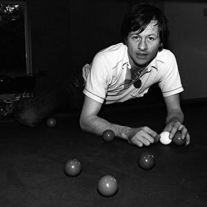 Alex Higgins World Snooker champion at his home 1982 sets up the balls on his